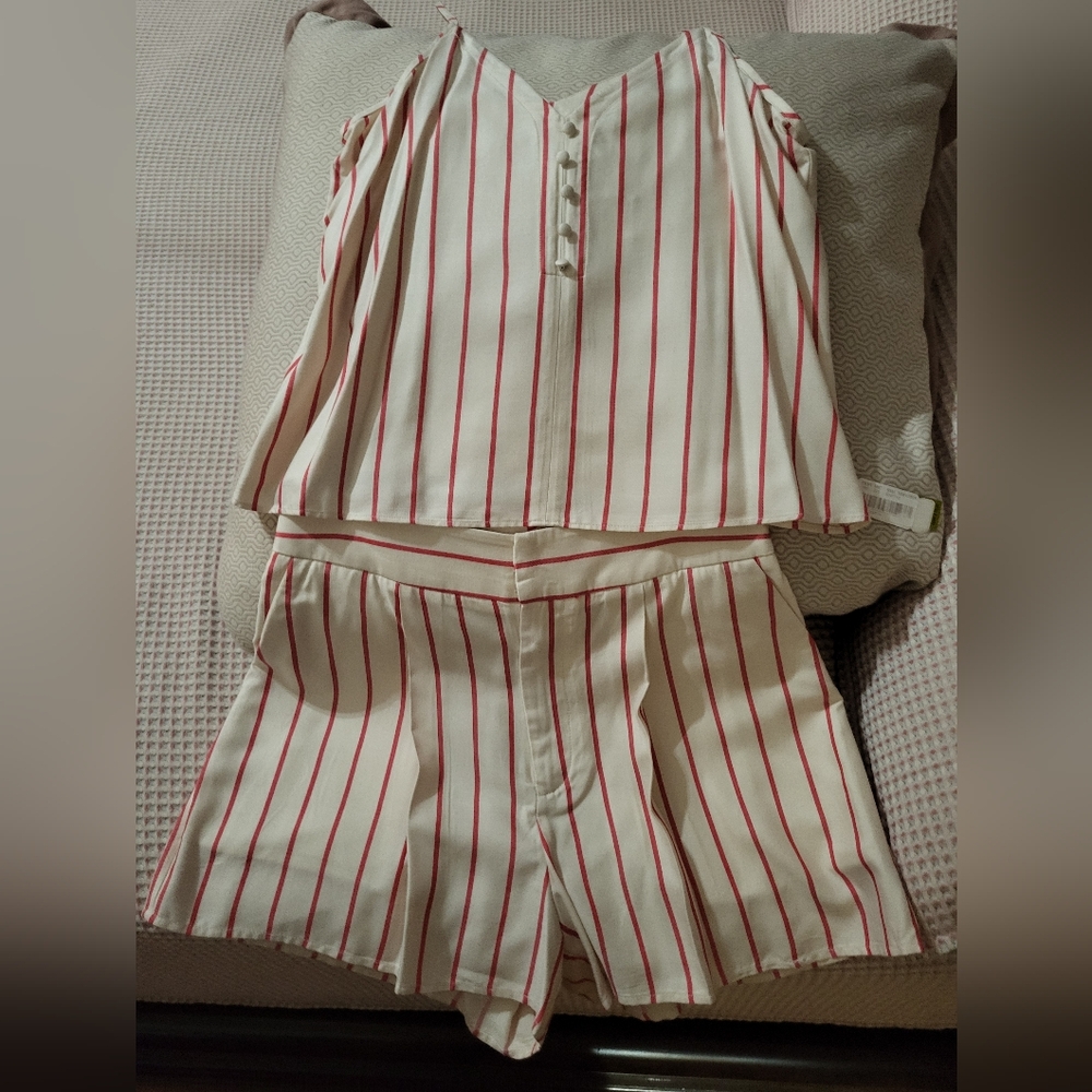 Two piece short set. Shorts has front pockets.